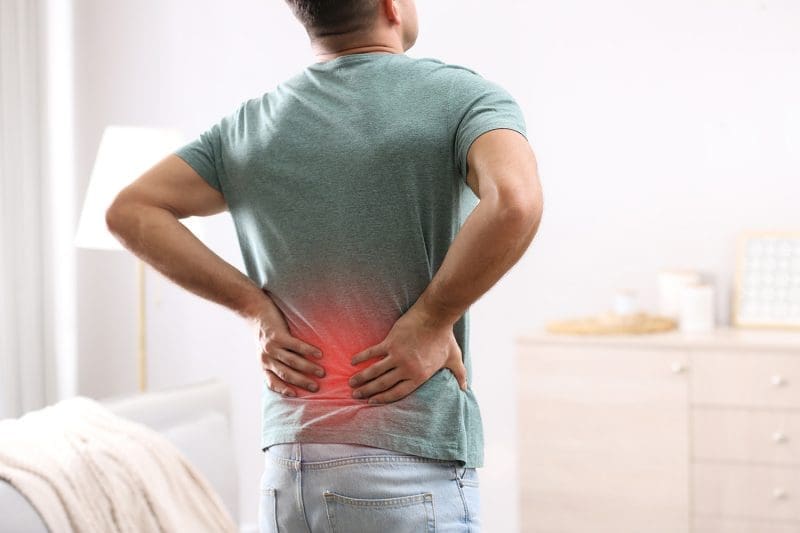 a man having a chronic back pain